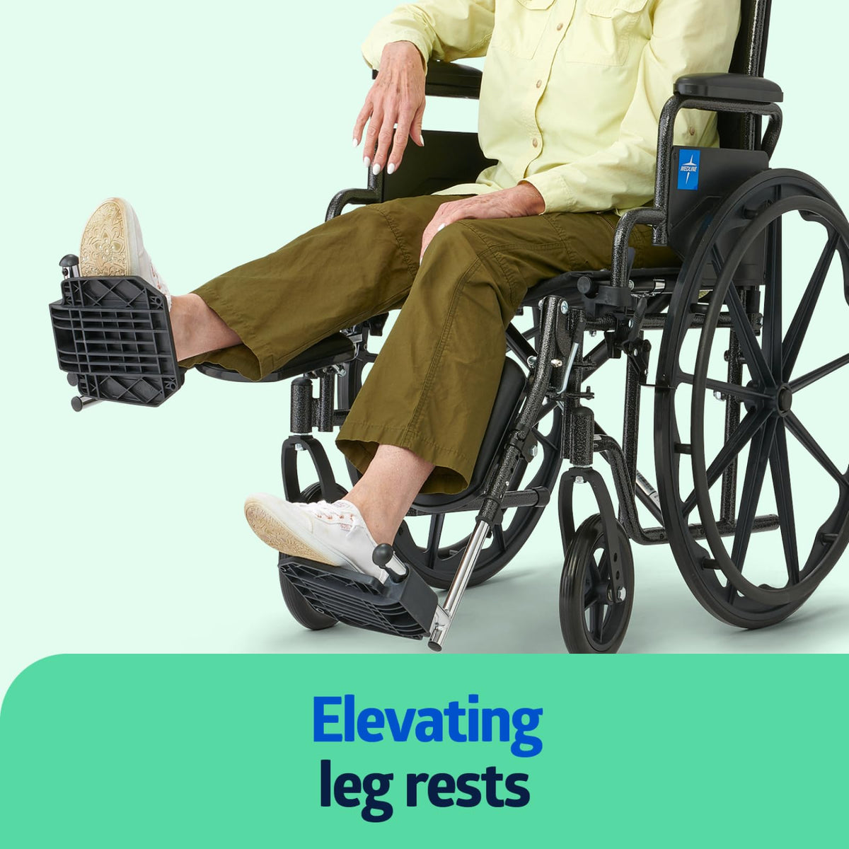 Folding Wheelchair with Swing-Back Desk-Length Arms and Elevating Footrests Q1288